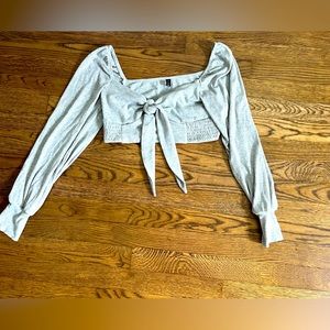Zaful size medium crop top. Bow in-front long sleeve. Never worn.